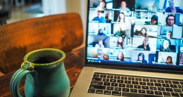 macbook pro displaying group of people